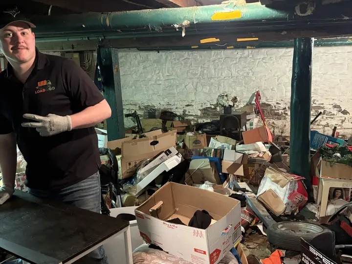 Cluttered basement before a Load & Go cleanout in Niagara Falls